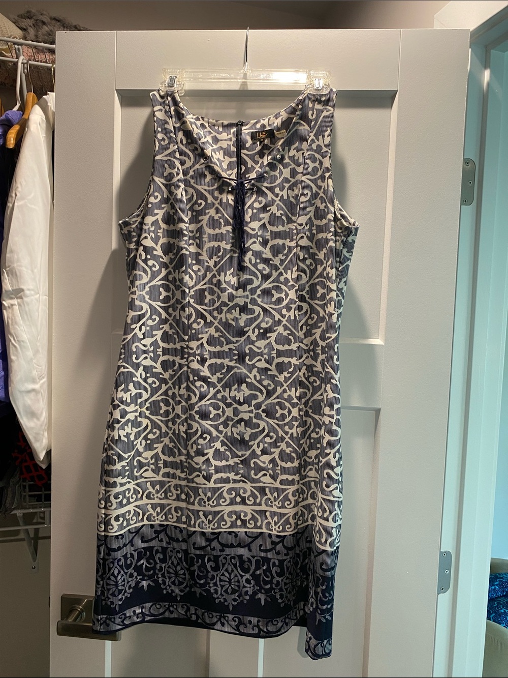 Sleeveless Navy Patterned Mini Dress with Tie Neck